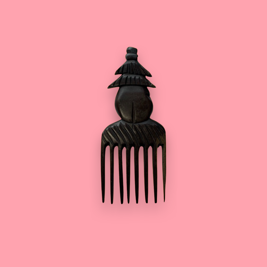 Afro Kamm Haus